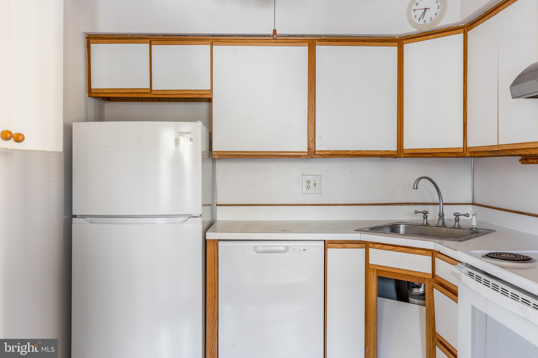 222 East Montgomery Avenue, Unit 207 Ardmore, PA 19003 - Photo 12 of 20 a view of storage and utility room with a washer and dryer