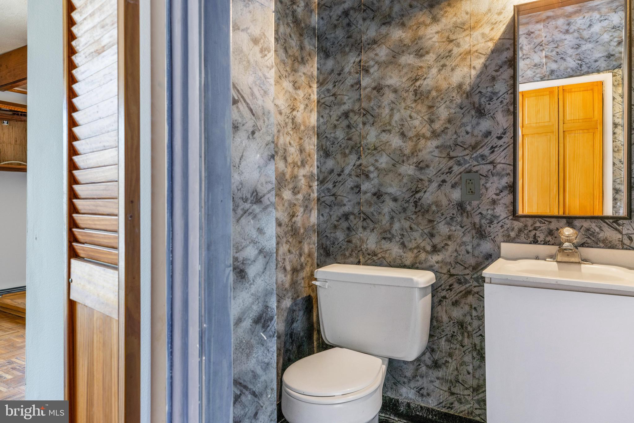 222 East Montgomery Avenue, Unit 207 Ardmore, PA 19003 - Photo 14 of 20 a bathroom with a toilet sink and shower