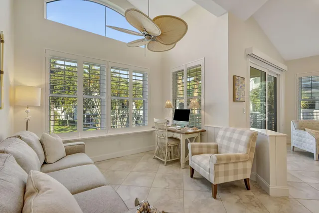 a view of a chairs and table in the patio