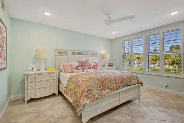 a view of a dining room with furniture and window