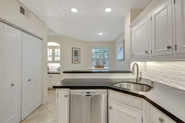 a view of a building with a yard