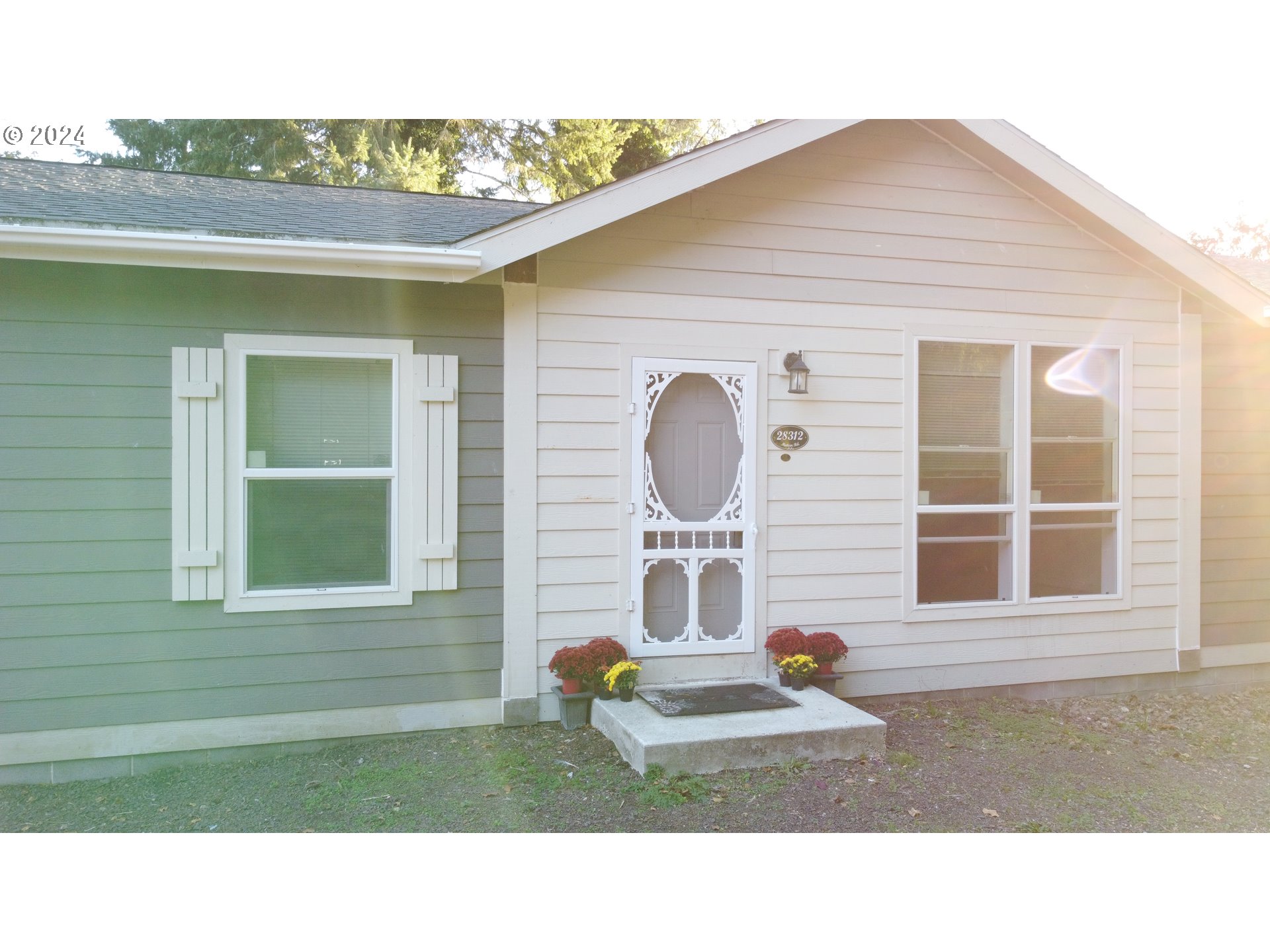 28312 Mateer Road Gold Beach, OR 97444 - Photo 2 of 25 a house view with a outdoor space