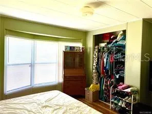 a view of a closet with storage