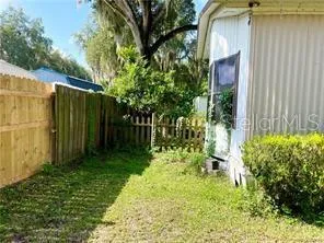 a view of a back yard of the house