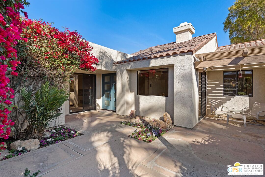 10201 Lakeview Drive Rancho Mirage, CA 92270 - Photo 14 of 28 a front view of a house with a sitting area
