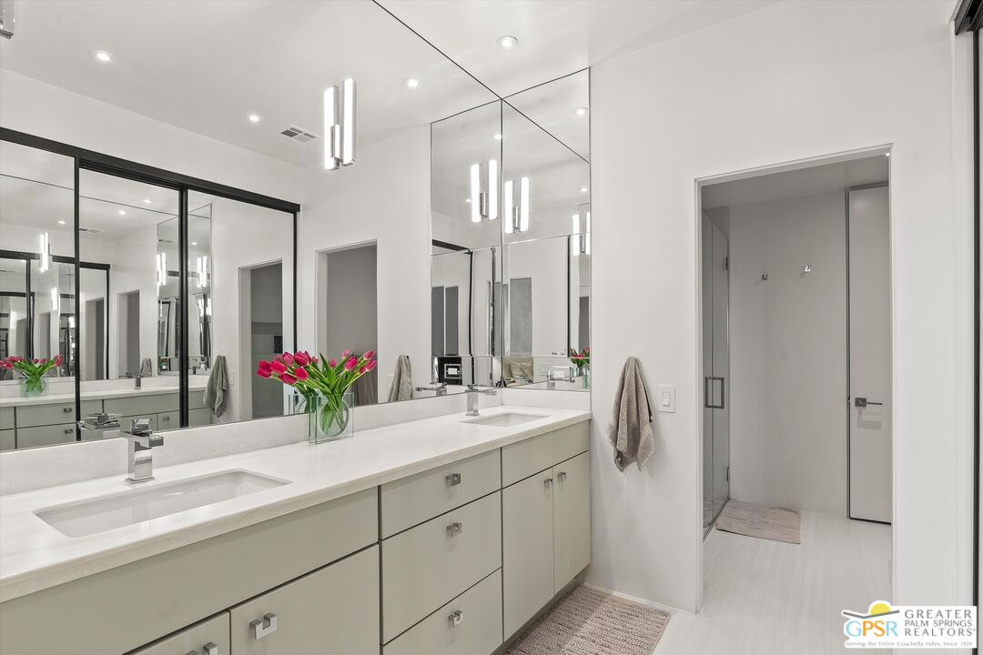 10201 Lakeview Drive Rancho Mirage, CA 92270 - Photo 28 of 28 a bathroom with a double vanity sink mirror and double