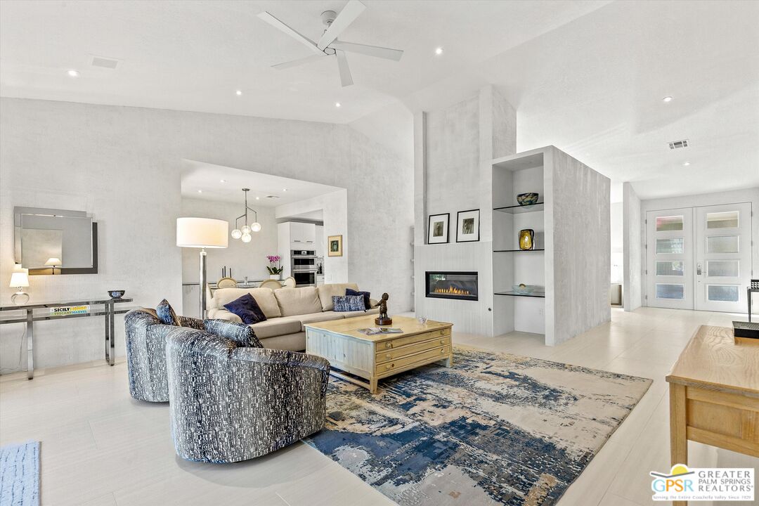 10201 Lakeview Drive Rancho Mirage, CA 92270 - Photo 4 of 28 a living room with furniture and a rug