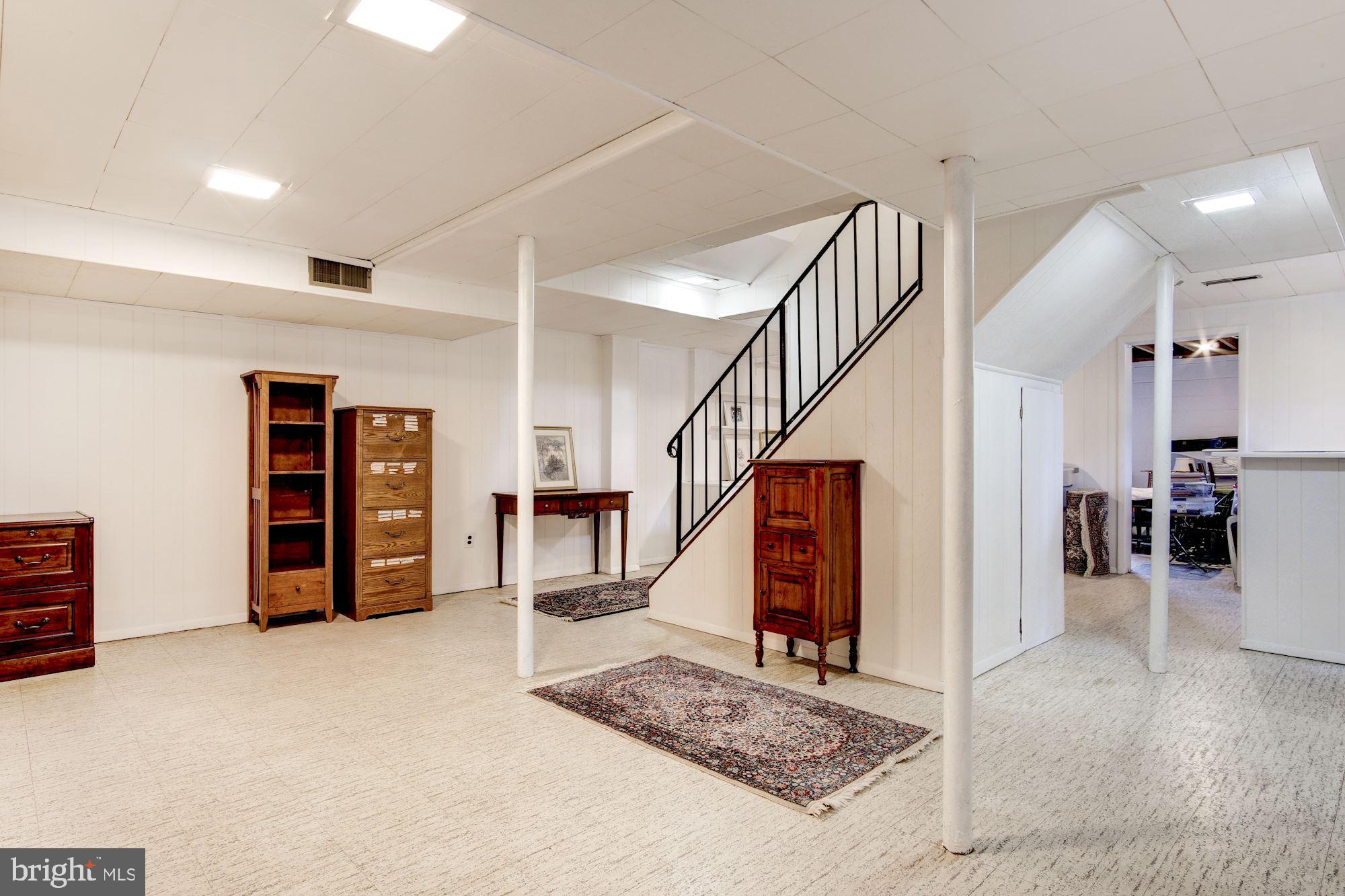 8208 Greeley Boulevard Springfield, VA 22152 - Photo 31 of 41 Lower level expansive rec room