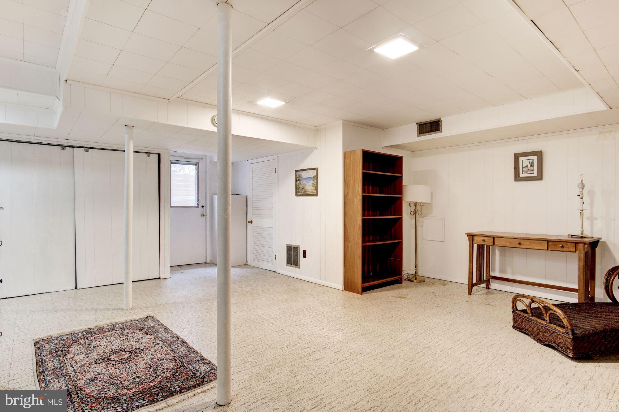8208 Greeley Boulevard Springfield, VA 22152 - Photo 32 of 41 Lower level expansive rec room