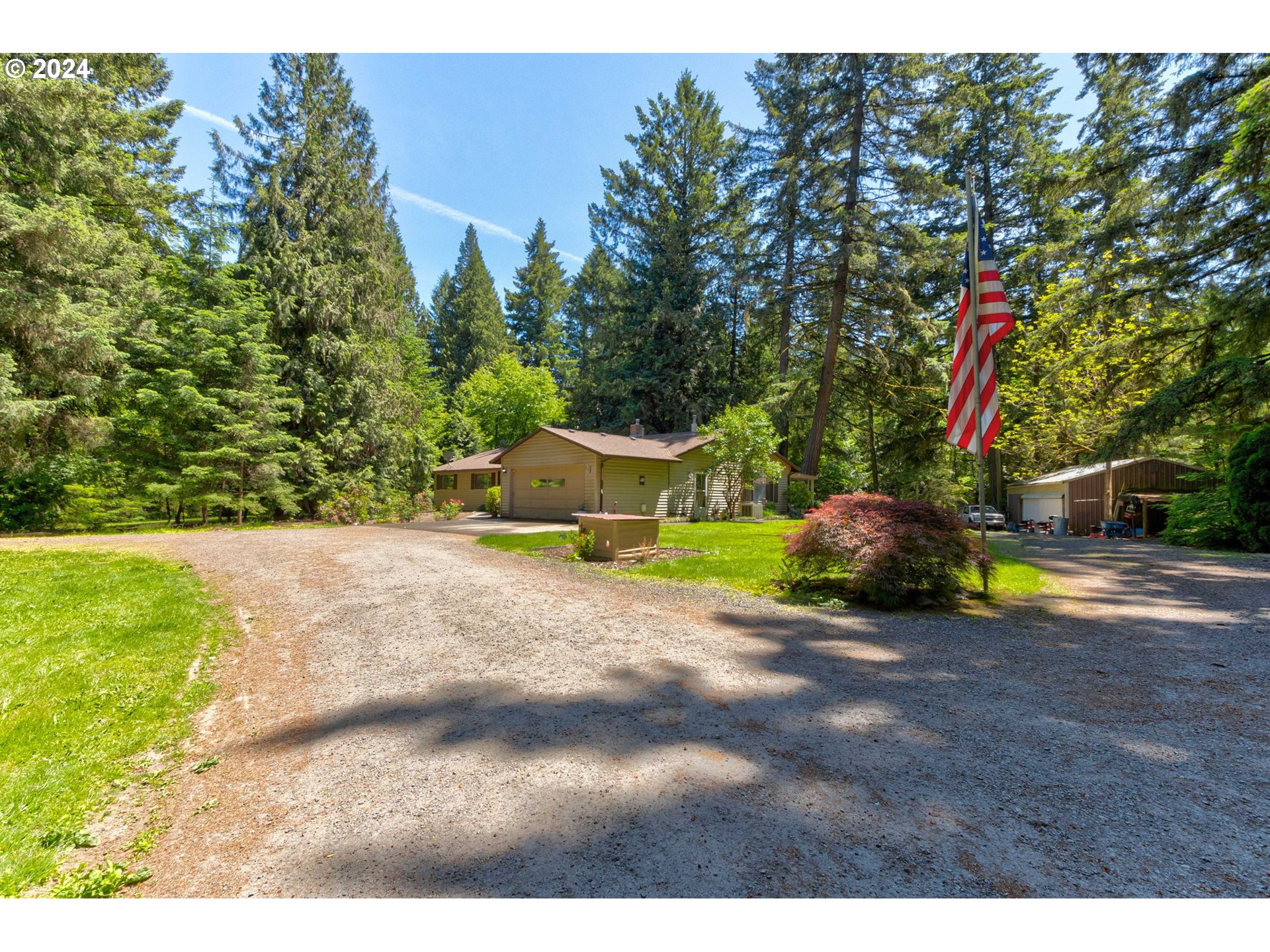 24100 Southwest Rosa Road Hillsboro, OR 97123 - Photo 1 of 30 a view of a house with garage and sitting area