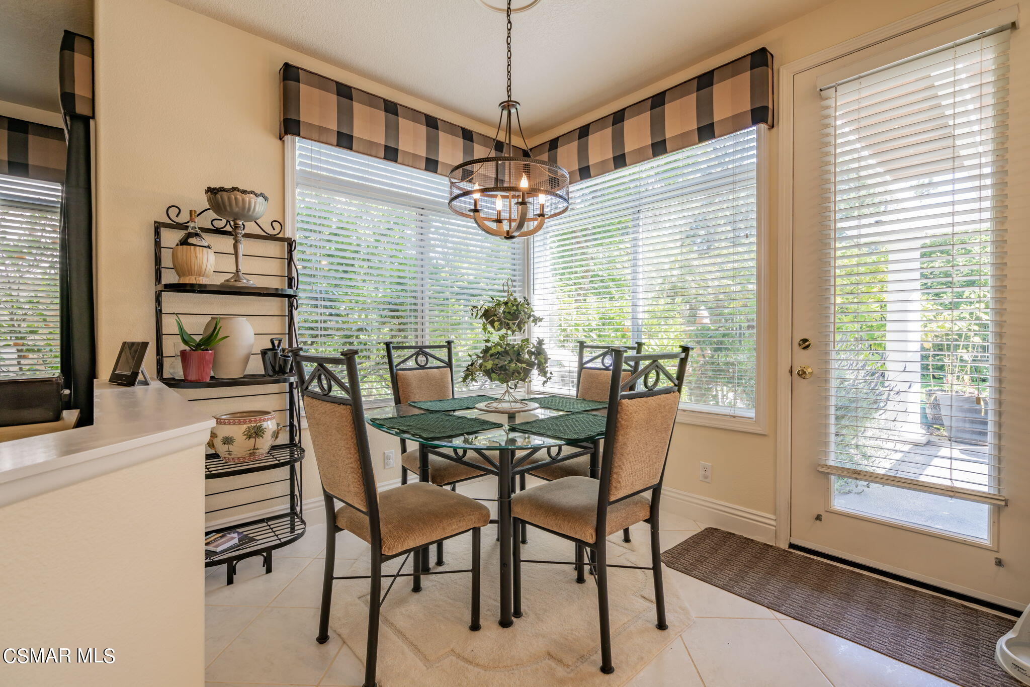 15606 Harte Lane Moorpark, CA 93021 - Photo 12 of 75 a dining room with furniture a chandelier and window