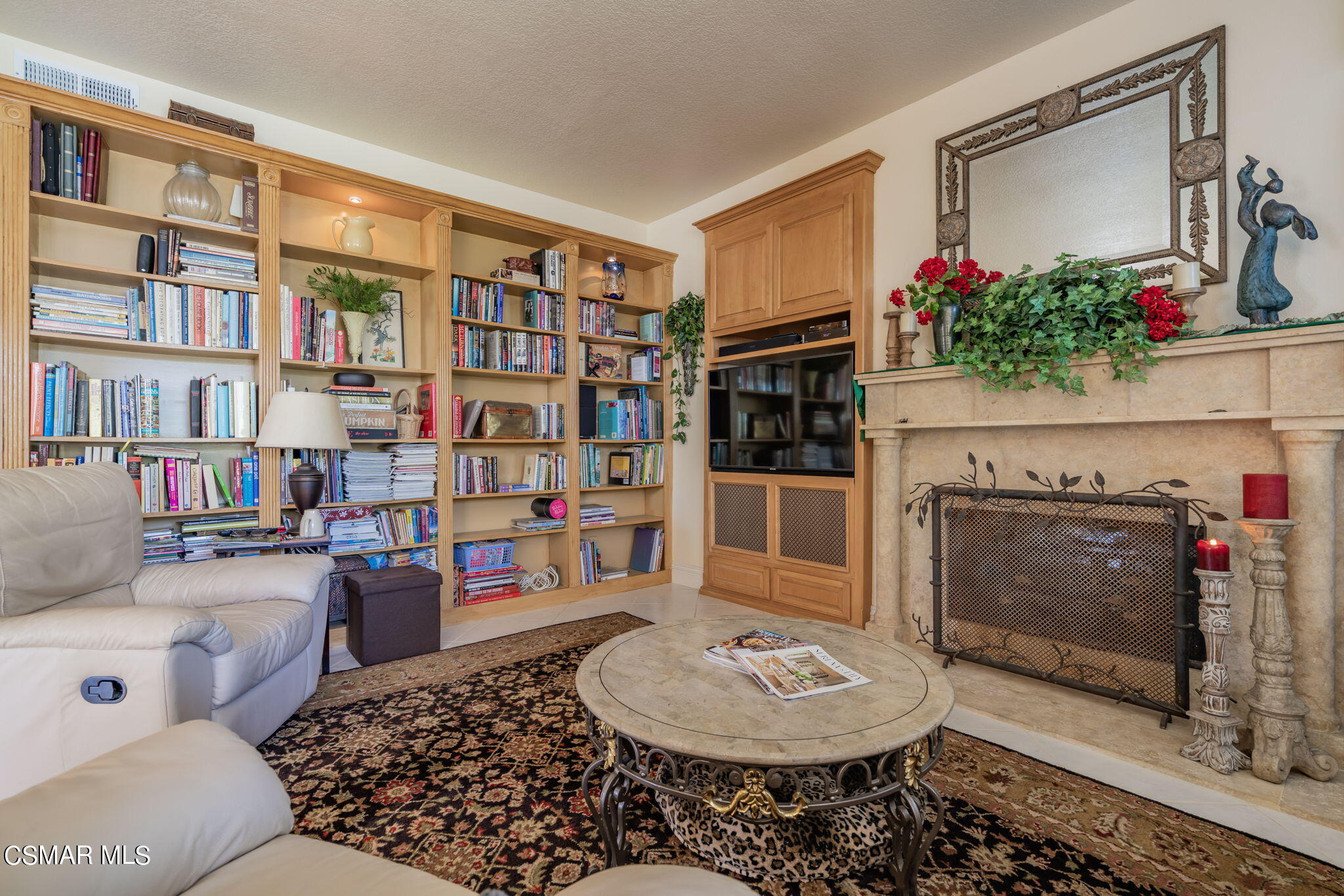 15606 Harte Lane Moorpark, CA 93021 - Photo 18 of 75 a living room with furniture and a fireplace