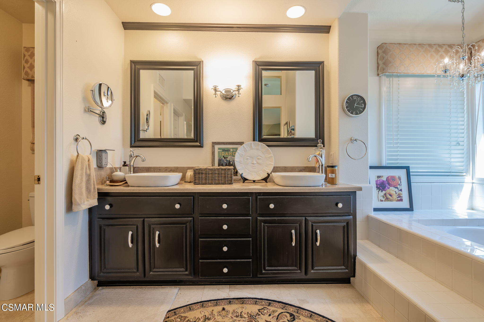 15606 Harte Lane Moorpark, CA 93021 - Photo 30 of 75 a bathroom with a granite countertop double vanity sink and mirror