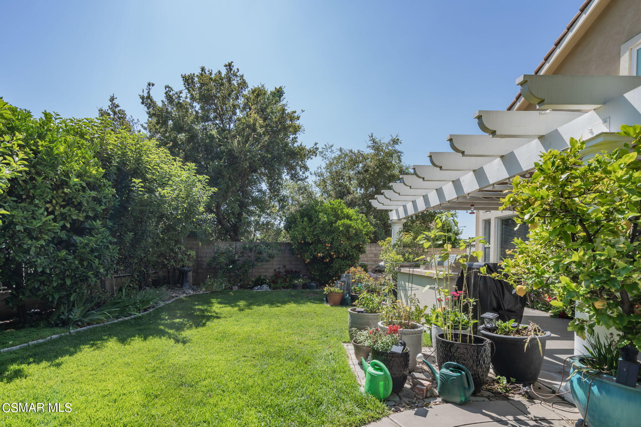 15606 Harte Lane Moorpark, CA 93021 - Photo 45 of 75 a view of yard with swimming pool and outdoor seating
