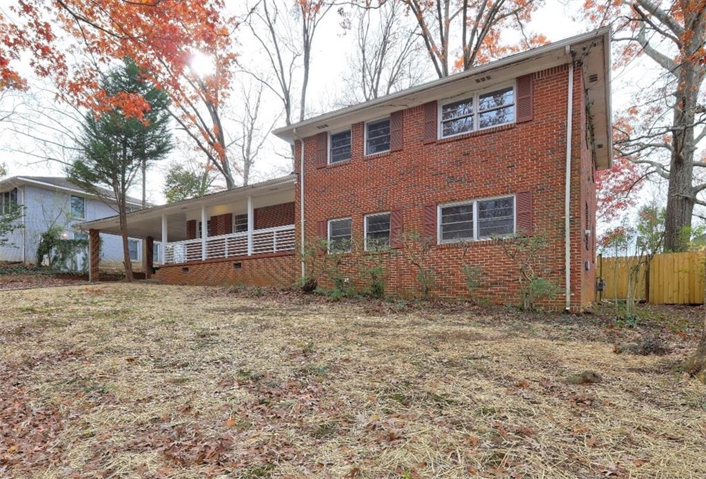 2371 Oakridge Court Decatur, GA 30032 - Photo 1 of 1 a house view with a backyard space