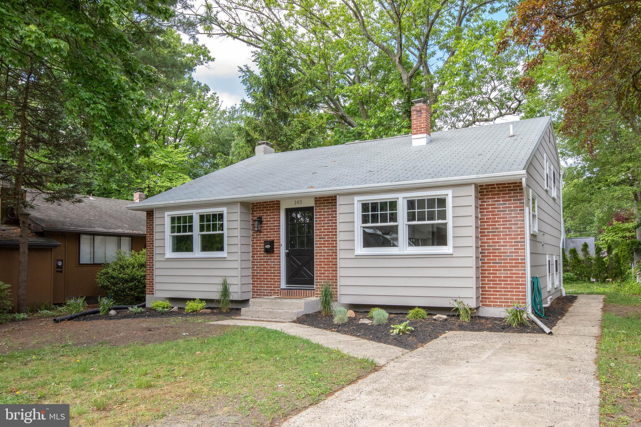 145 Forrest Avenue Runnemede, NJ 08078 - Photo 1 of 40 a front view of a house with garden