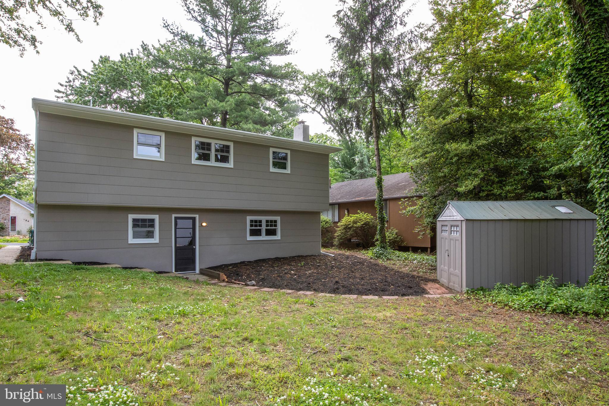 145 Forrest Avenue Runnemede, NJ 08078 - Photo 22 of 40 a backyard of a house with lots of green space