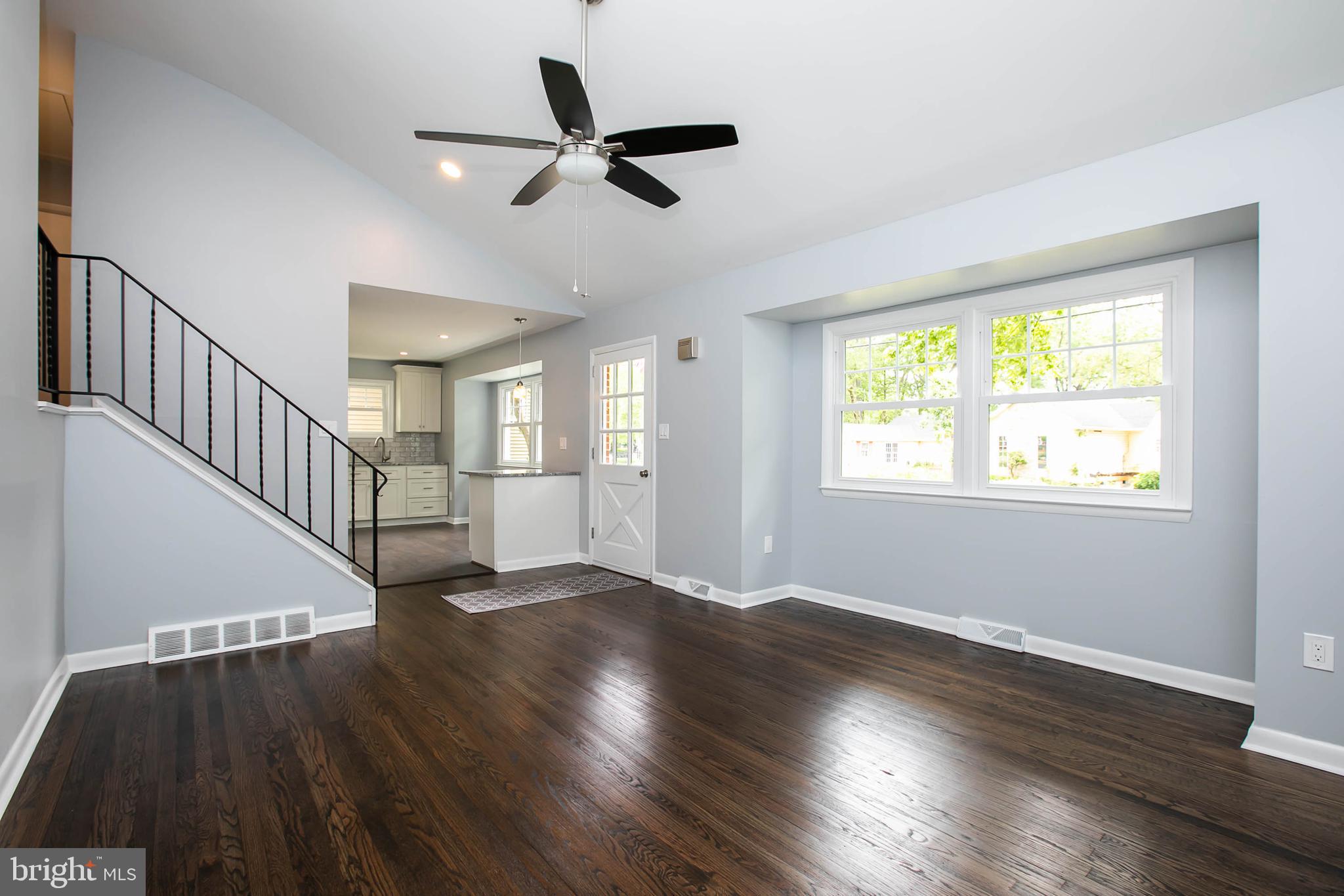 145 Forrest Avenue Runnemede, NJ 08078 - Photo 5 of 40 a view of an empty room with wooden floor and a window