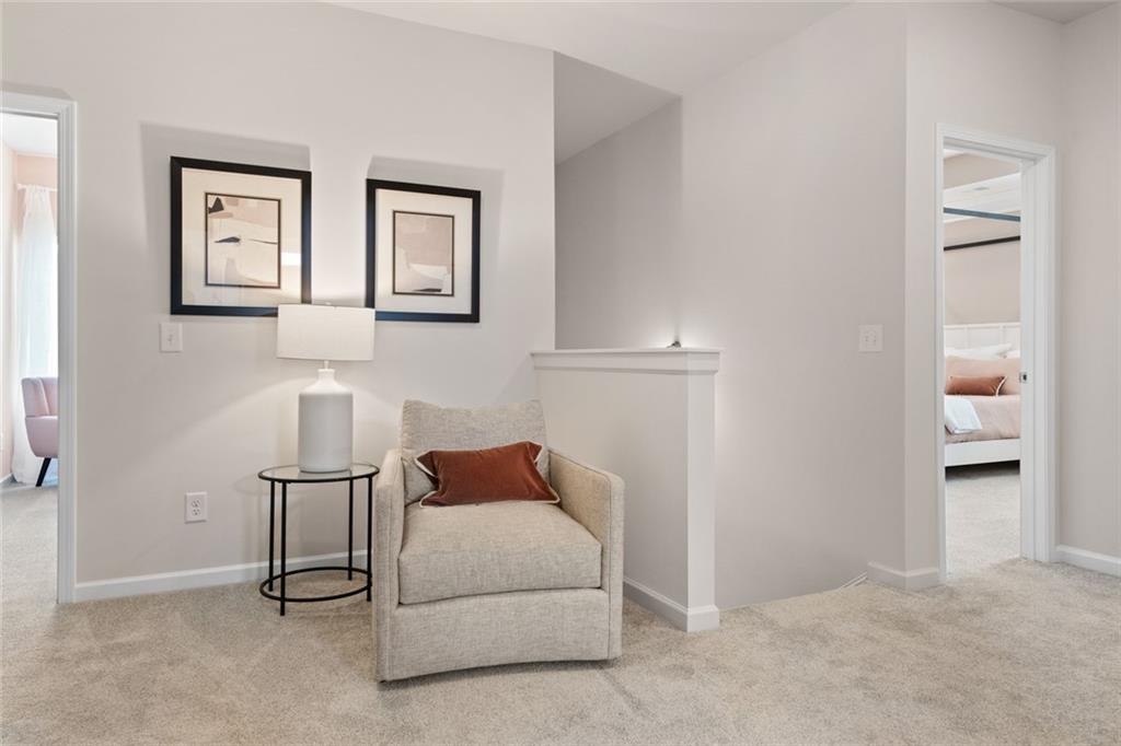 727 Sinclair Lane Temple, GA 30179 - Photo 26 of 44 a bedroom with a bed and a lamp