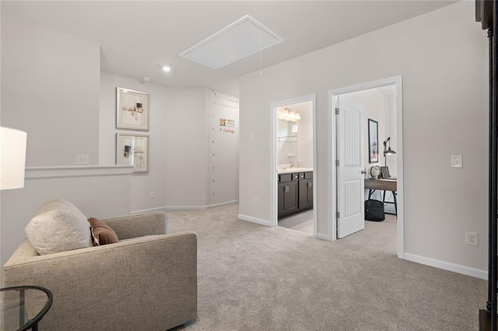 727 Sinclair Lane Temple, GA 30179 - Photo 27 of 44 a living room with furniture and hallway