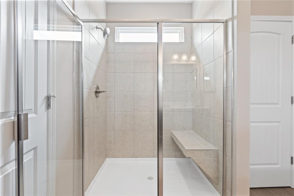 727 Sinclair Lane Temple, GA 30179 - Photo 41 of 44 a bathroom with a glass shower door