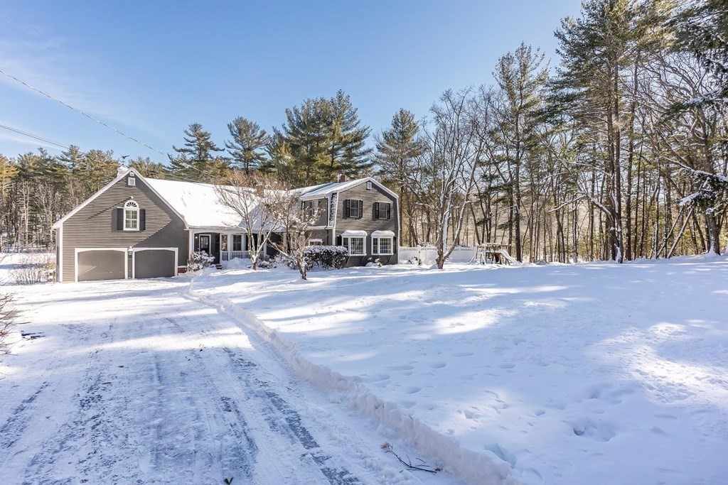 64 Jenkins Road Andover, MA 01810 - Photo 1 of 31 a front view of a house with a yard