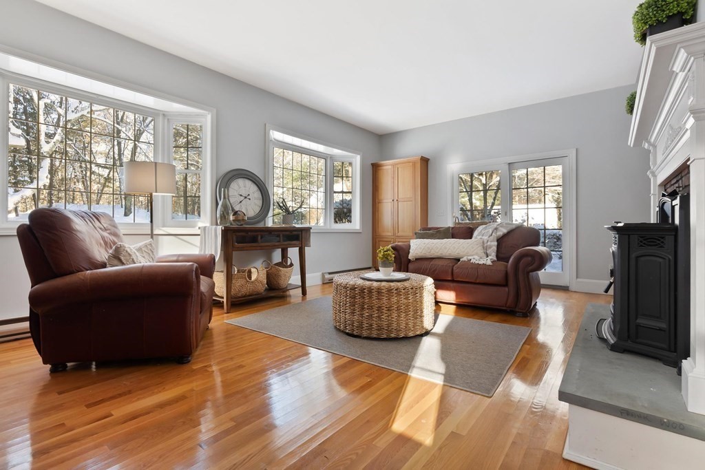 64 Jenkins Road Andover, MA 01810 - Photo 12 of 31 a living room with furniture and a fireplace