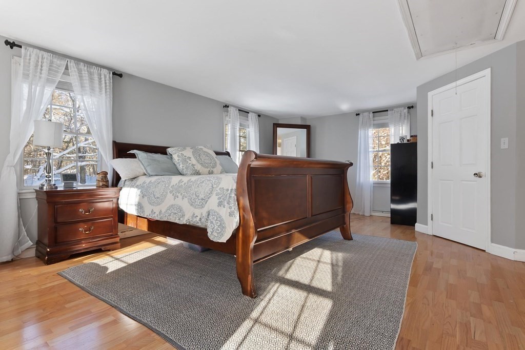 64 Jenkins Road Andover, MA 01810 - Photo 15 of 31 a bedroom with furniture and a window