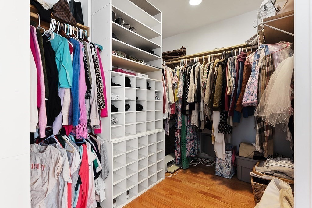 64 Jenkins Road Andover, MA 01810 - Photo 16 of 31 a view of walk in closet with clothes and shoes