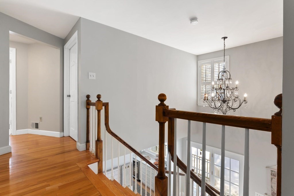 64 Jenkins Road Andover, MA 01810 - Photo 19 of 31 a view of a hallway with windows