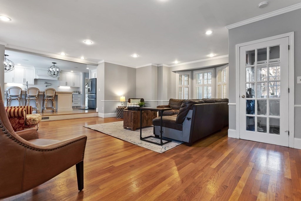 64 Jenkins Road Andover, MA 01810 - Photo 2 of 31 a living room kitchen with furniture and a wooden floor