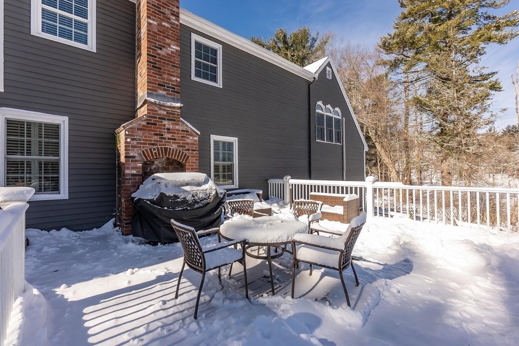 64 Jenkins Road Andover, MA 01810 - Photo 28 of 31 a balcony with table and chairs