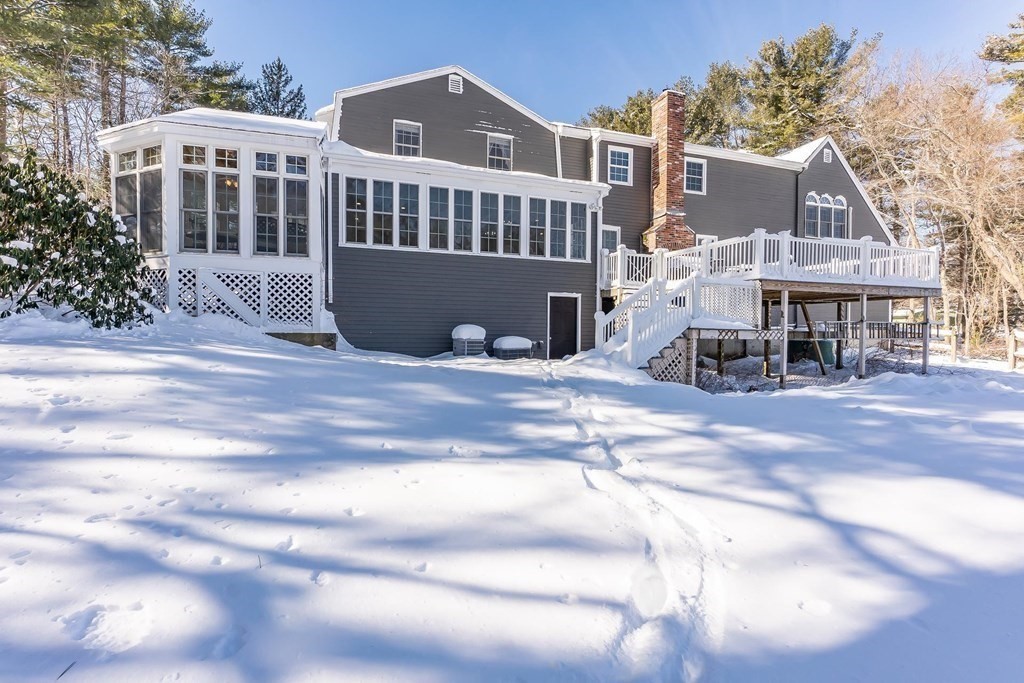 64 Jenkins Road Andover, MA 01810 - Photo 30 of 31 a view of a building with a patio