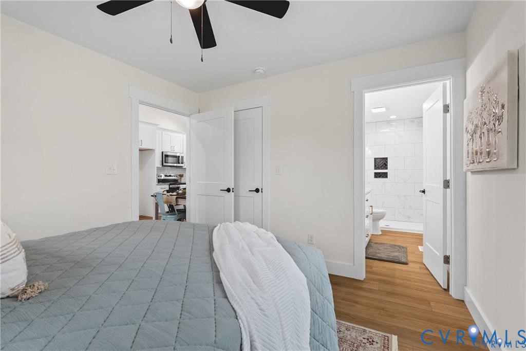 Tbd Summer Drive Ruther Glen, VA 22546 - Photo 14 of 25 a bedroom with a bed and a view of bathroom