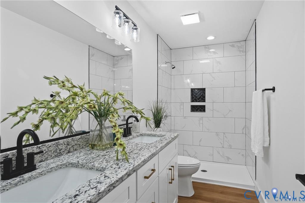 Tbd Summer Drive Ruther Glen, VA 22546 - Photo 15 of 25 a bathroom with a granite countertop sink a toilet and shower