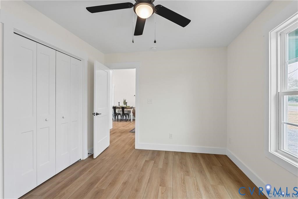 Tbd Summer Drive Ruther Glen, VA 22546 - Photo 19 of 25 wooden floor in an empty room with a window