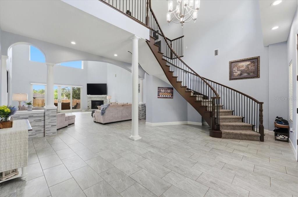 3943 West Campbell Road Lakeland, FL 33810 - Photo 21 of 95 a view of entryway and livingroom with furniture