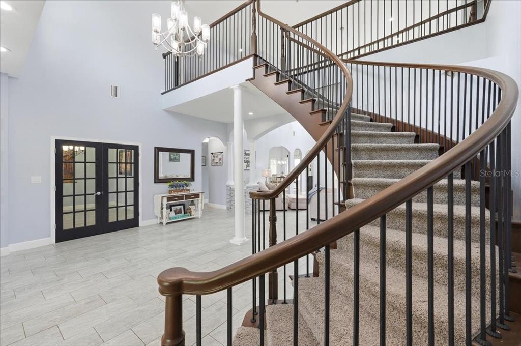 3943 West Campbell Road Lakeland, FL 33810 - Photo 23 of 95 a view of entryway and hall with wooden floor