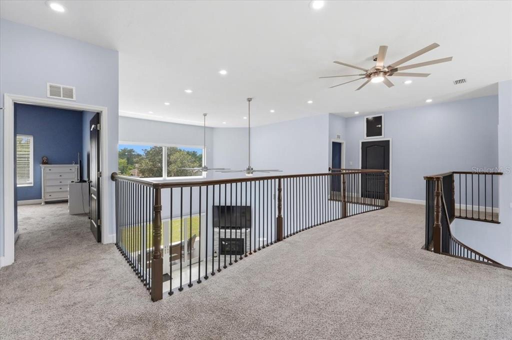 3943 West Campbell Road Lakeland, FL 33810 - Photo 65 of 95 a view of a hallway with workspace