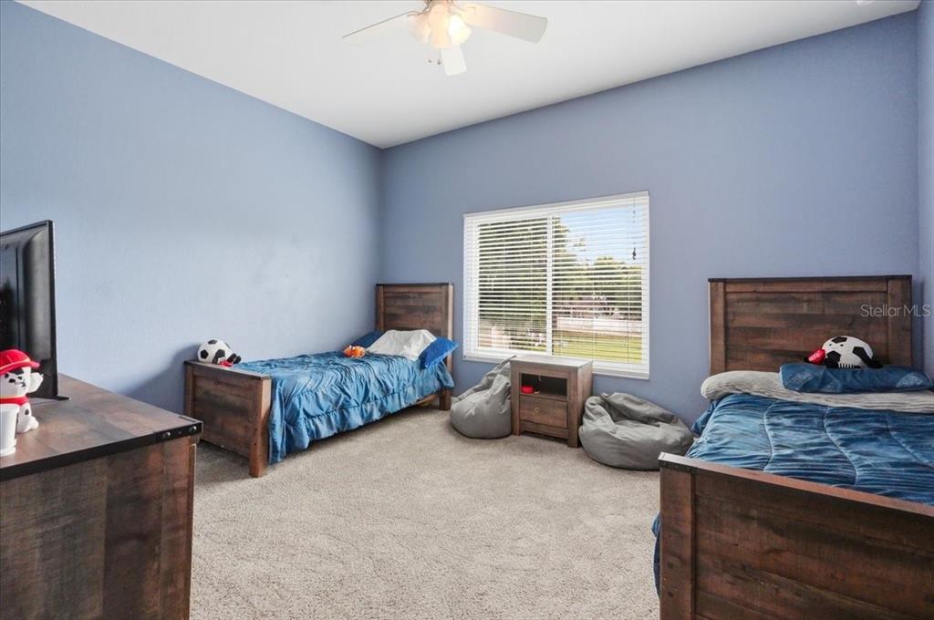 3943 West Campbell Road Lakeland, FL 33810 - Photo 66 of 95 a bedroom with furniture and a window