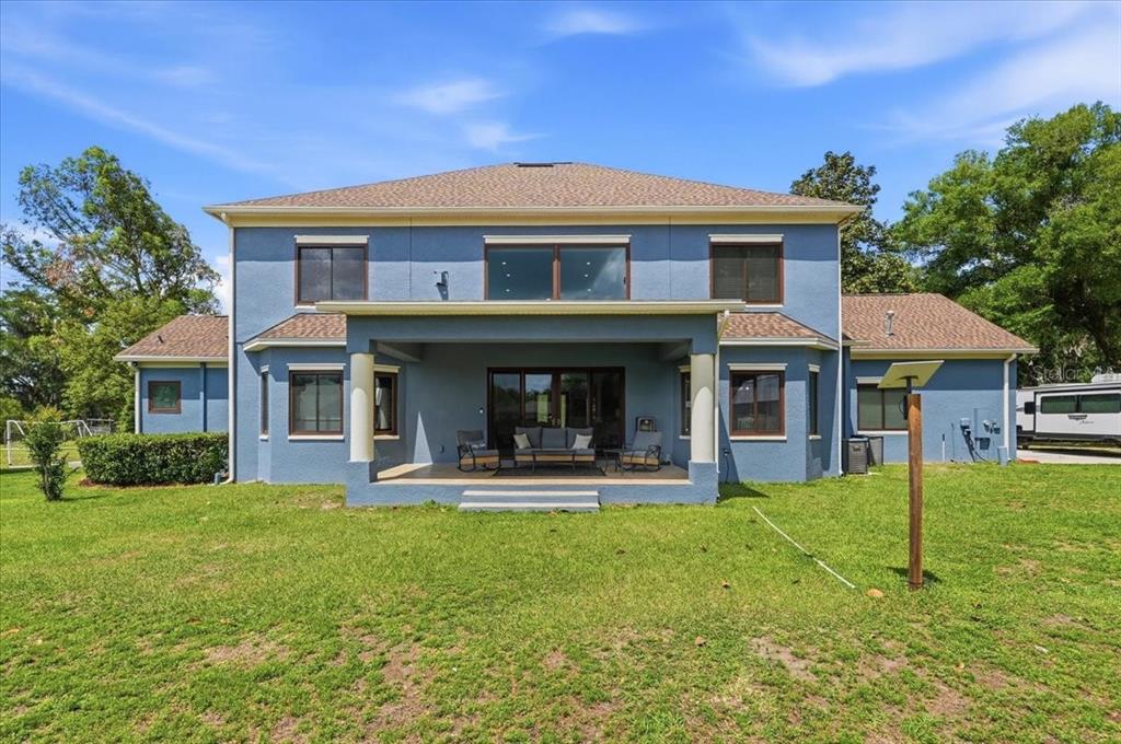 3943 West Campbell Road Lakeland, FL 33810 - Photo 7 of 95 a front view of a house with garden