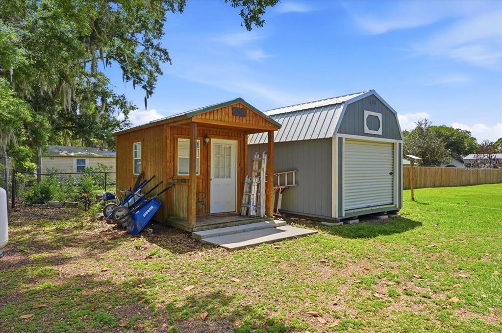3943 West Campbell Road Lakeland, FL 33810 - Photo 86 of 95 a view of backyard with a garden and entertaining space