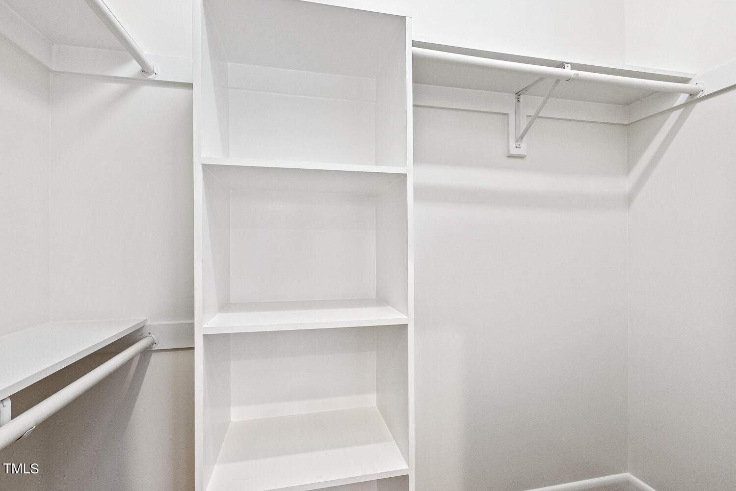 805 The Village Circle Raleigh, NC 27615 - Photo 22 of 42 a view of an empty walk in closet