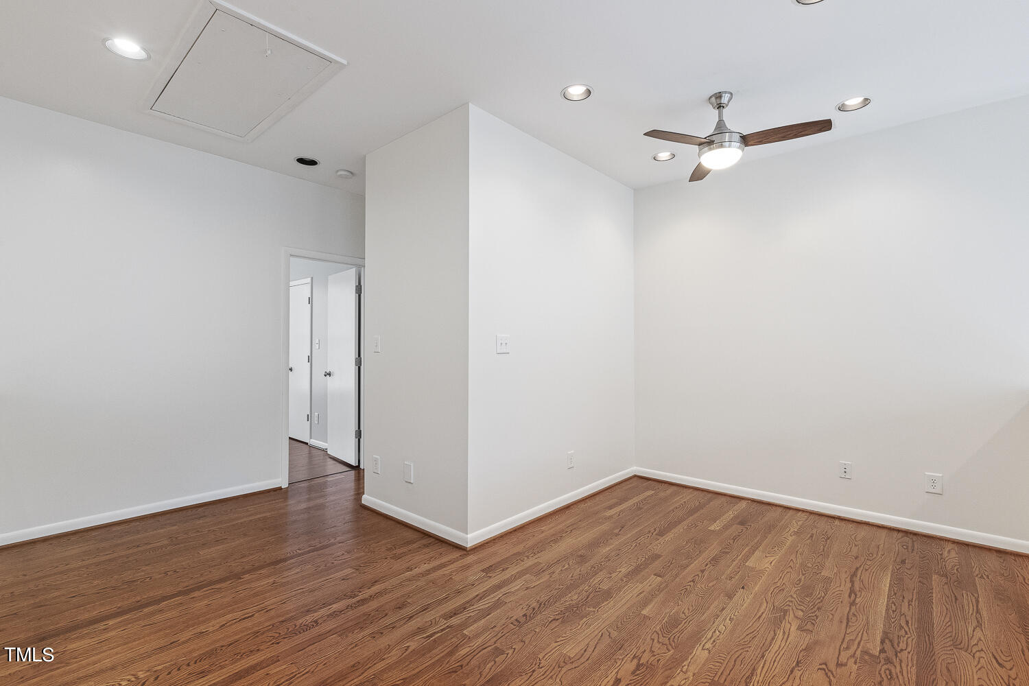 805 The Village Circle Raleigh, NC 27615 - Photo 25 of 42 wooden floor in an empty room