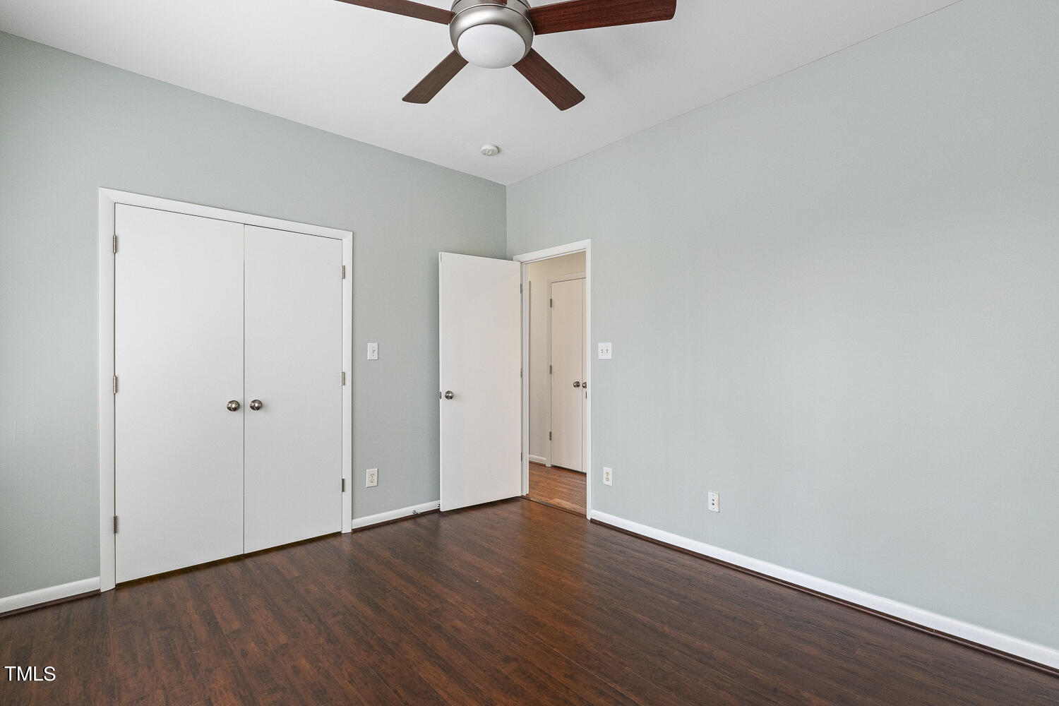 805 The Village Circle Raleigh, NC 27615 - Photo 29 of 42 a view of an empty room and wooden floor