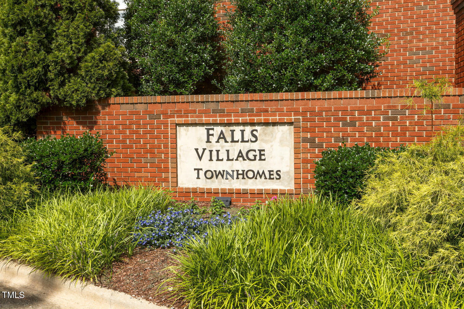 805 The Village Circle Raleigh, NC 27615 - Photo 3 of 42 a sign on the side of a building