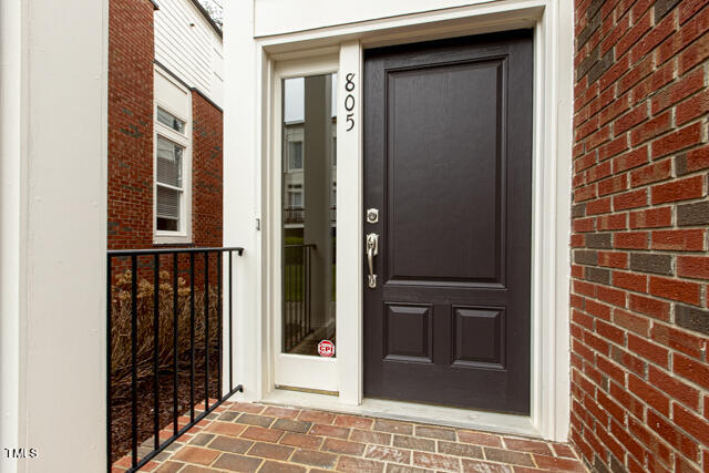 805 The Village Circle Raleigh, NC 27615 - Photo 4 of 42 a view of a entryway door of the house