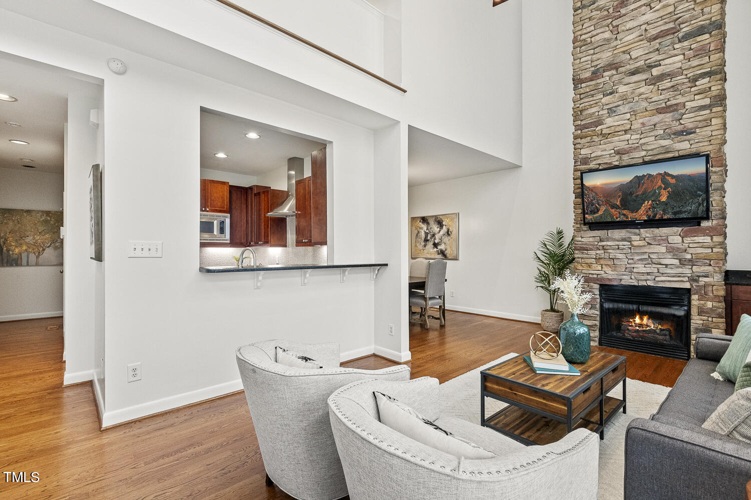 805 The Village Circle Raleigh, NC 27615 - Photo 7 of 42 a living room with furniture and a fireplace