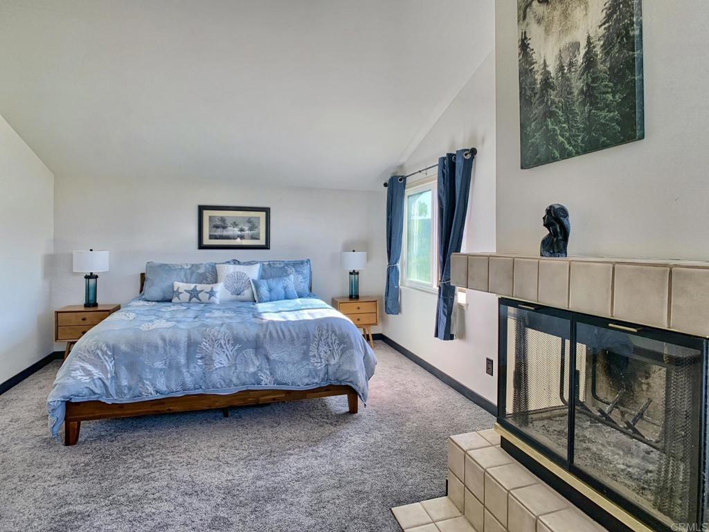 28743 Lebanon Road Pine Valley, CA 91962 - Photo 15 of 46 a bedroom with a bed and wooden floor