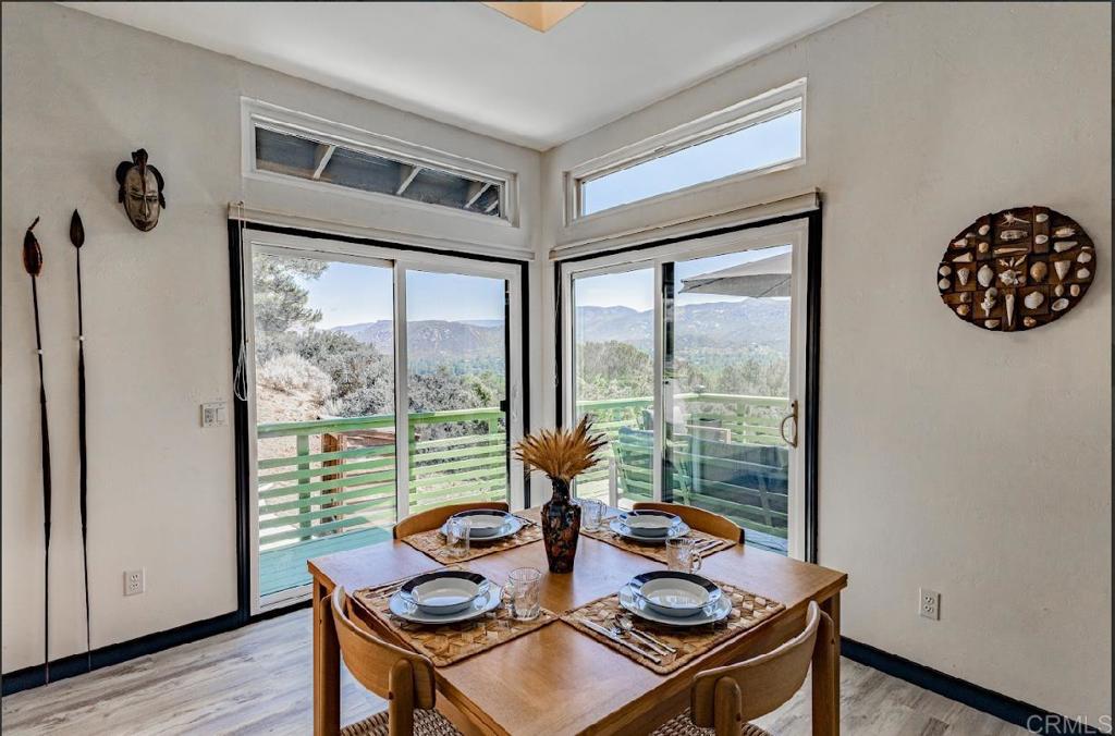 28743 Lebanon Road Pine Valley, CA 91962 - Photo 26 of 46 a view of a dining room with furniture window and wooden floor